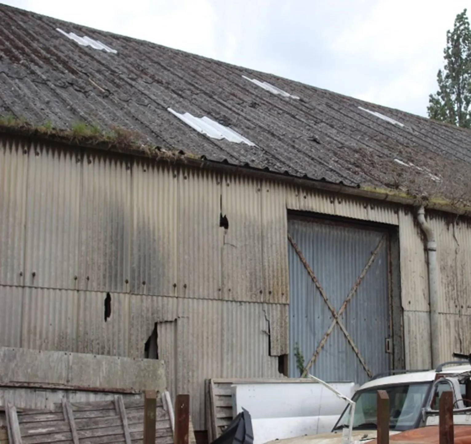 Asbestos cement downpipe and panels
