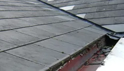 Asbestos cement roof tiles