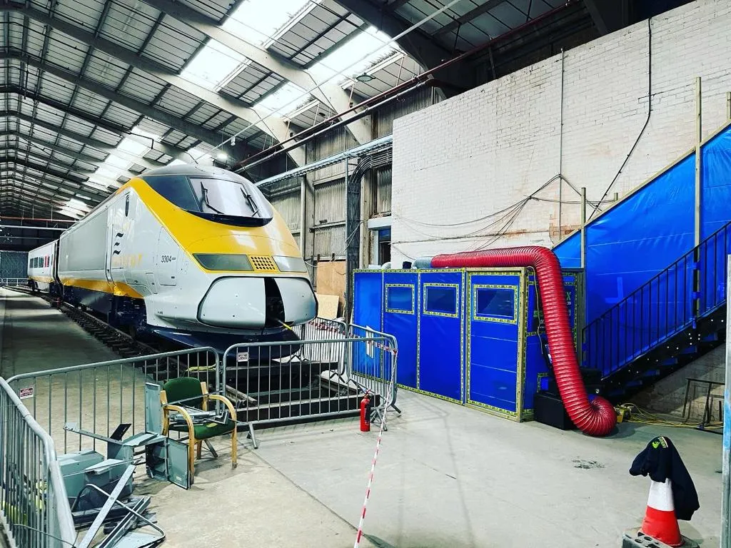 INNOX asbestos removal containment enclosure at a train depot