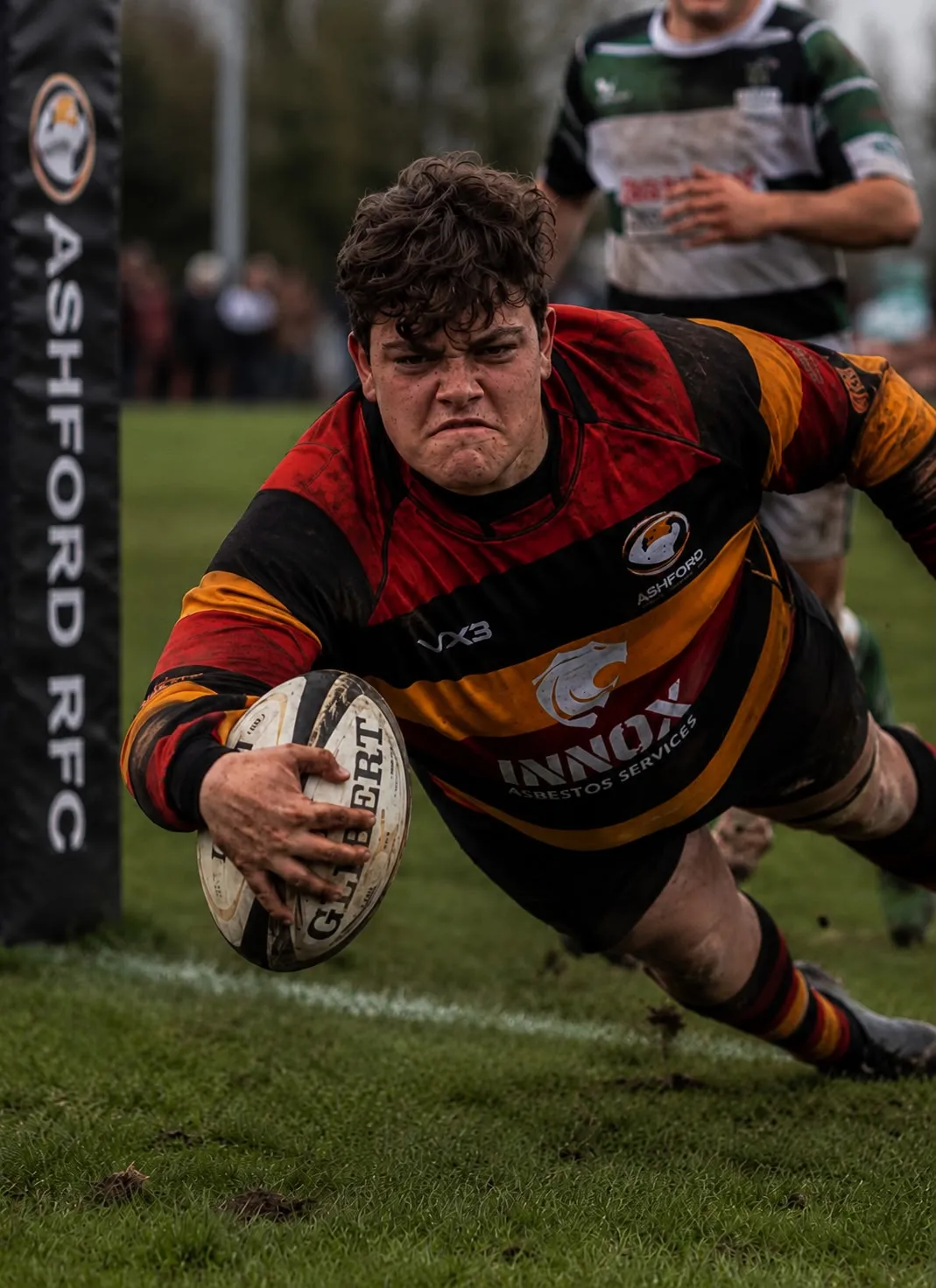 Ashford RFC player scoring a try in INNOX-sponsored colours