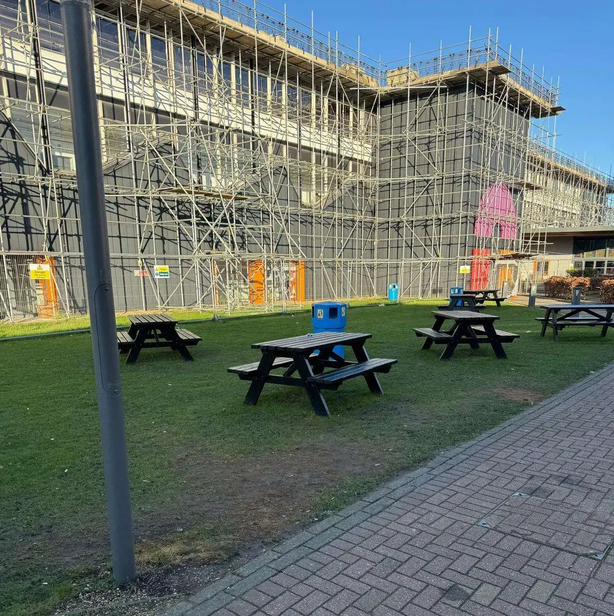 Scaffolded exterior of the Norwich Building at City College Norwich during INNOX asbestos removal works