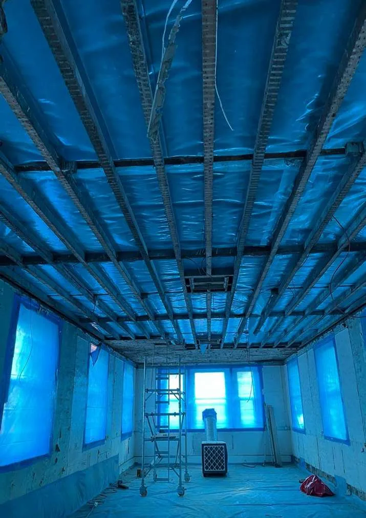 Licensed asbestos removal enclosure inside a first-floor loft at Royal Marsden Hospital D Block, London