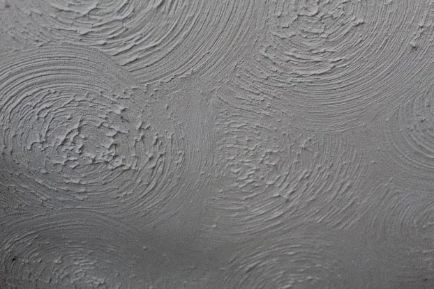 Sprayed asbestos coating